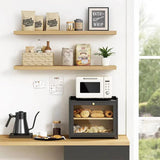 Kitchen countertop with three layers of water and fruit baskets, layered household storage, and display shelves for bread and vegetables